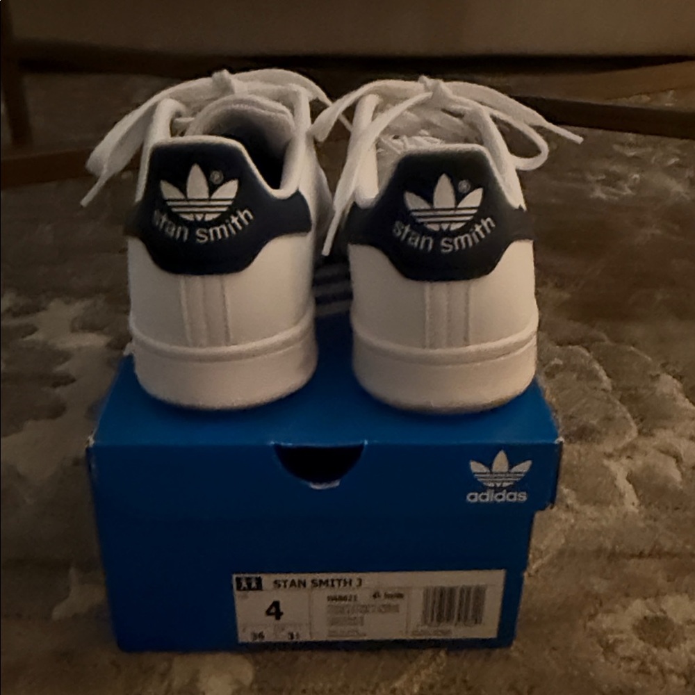 Adidas Kids Sneakers White and Navy. Kids size 4 and fit women’s size 5.5